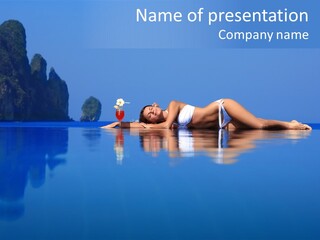 A Woman In A Bikini Laying On The Water PowerPoint Template