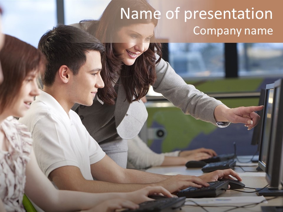 A Group Of People Working On A Computer PowerPoint Template