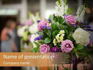 A Vase Filled With Lots Of Purple And White Flowers PowerPoint Template