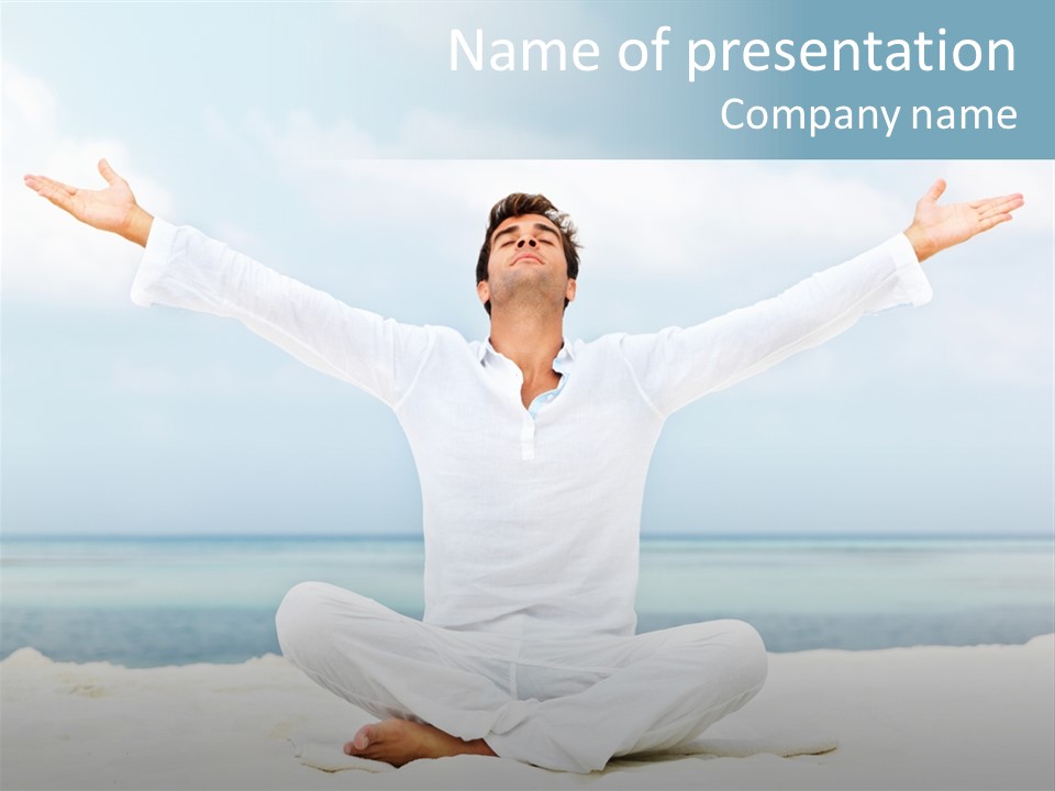 A Man Sitting In A Yoga Pose On The Beach PowerPoint Template