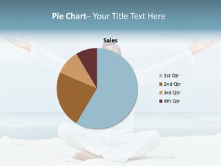 A Man Sitting In A Yoga Pose On The Beach PowerPoint Template