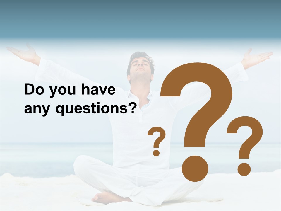 A Man Sitting In A Yoga Pose On The Beach PowerPoint Template