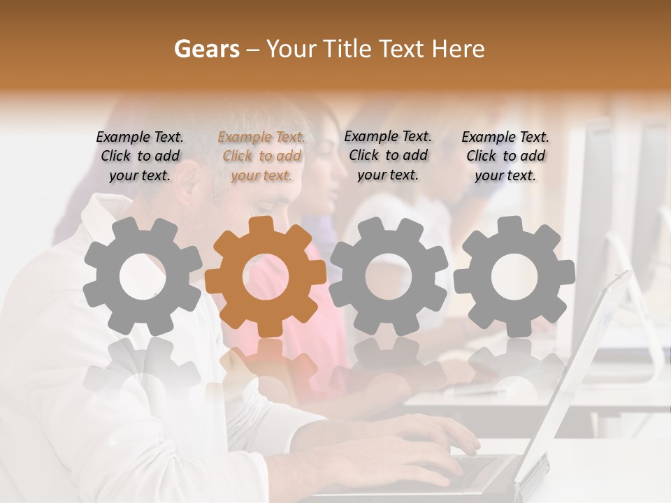 A Group Of People Sitting At A Table With Computers PowerPoint Template