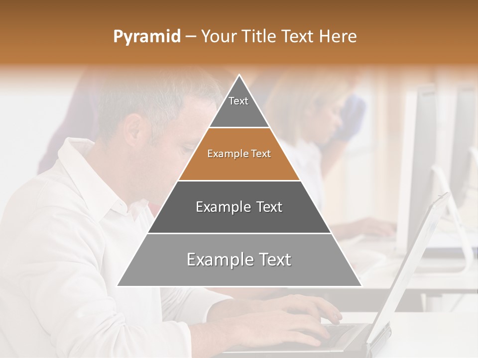A Group Of People Sitting At A Table With Computers PowerPoint Template