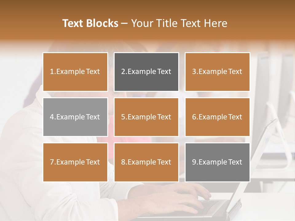 A Group Of People Sitting At A Table With Computers PowerPoint Template