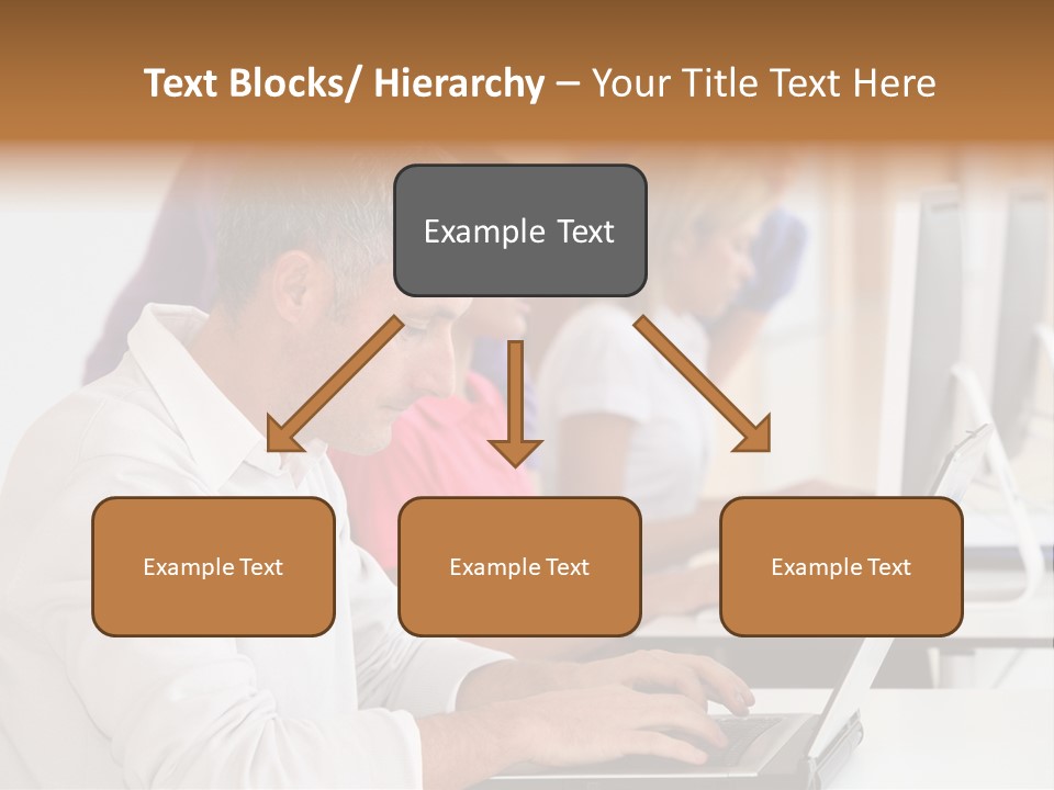 A Group Of People Sitting At A Table With Computers PowerPoint Template