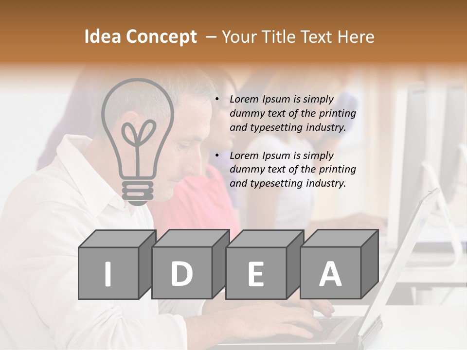 A Group Of People Sitting At A Table With Computers PowerPoint Template