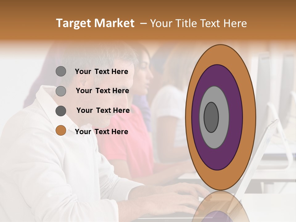 A Group Of People Sitting At A Table With Computers PowerPoint Template