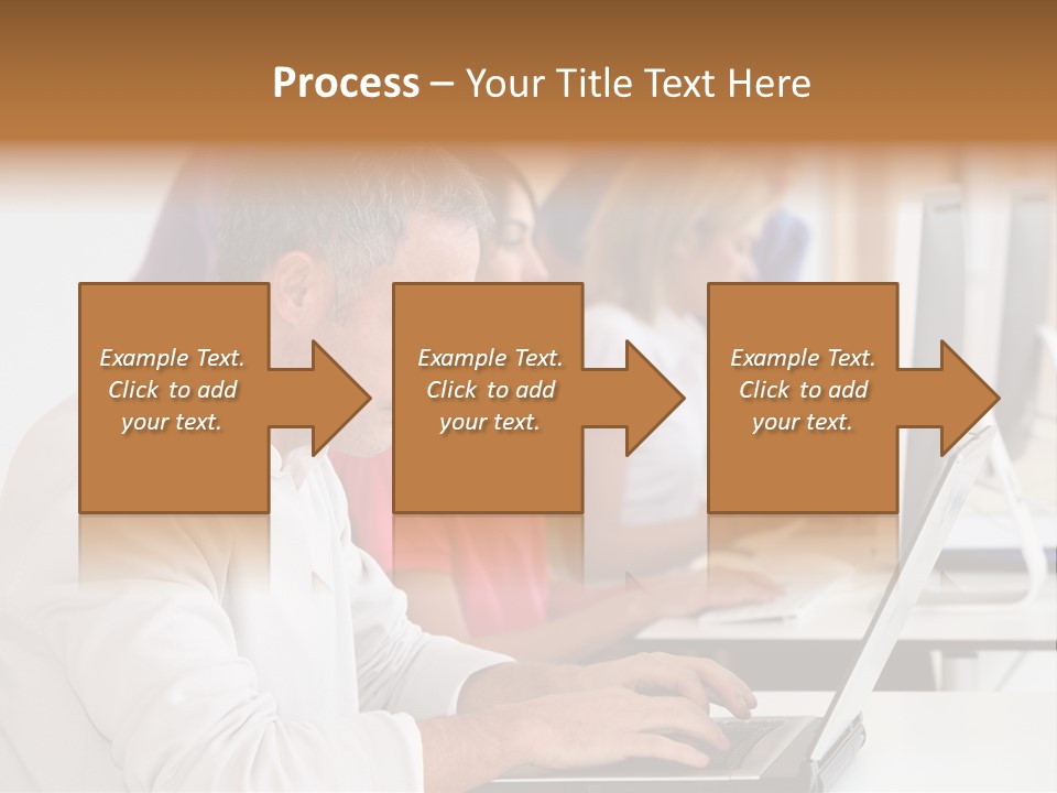 A Group Of People Sitting At A Table With Computers PowerPoint Template
