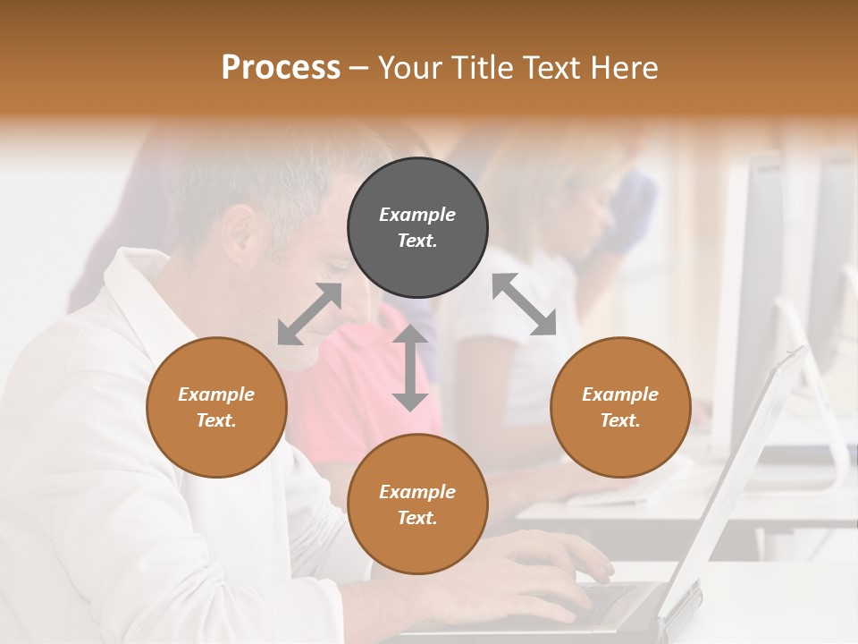 A Group Of People Sitting At A Table With Computers PowerPoint Template
