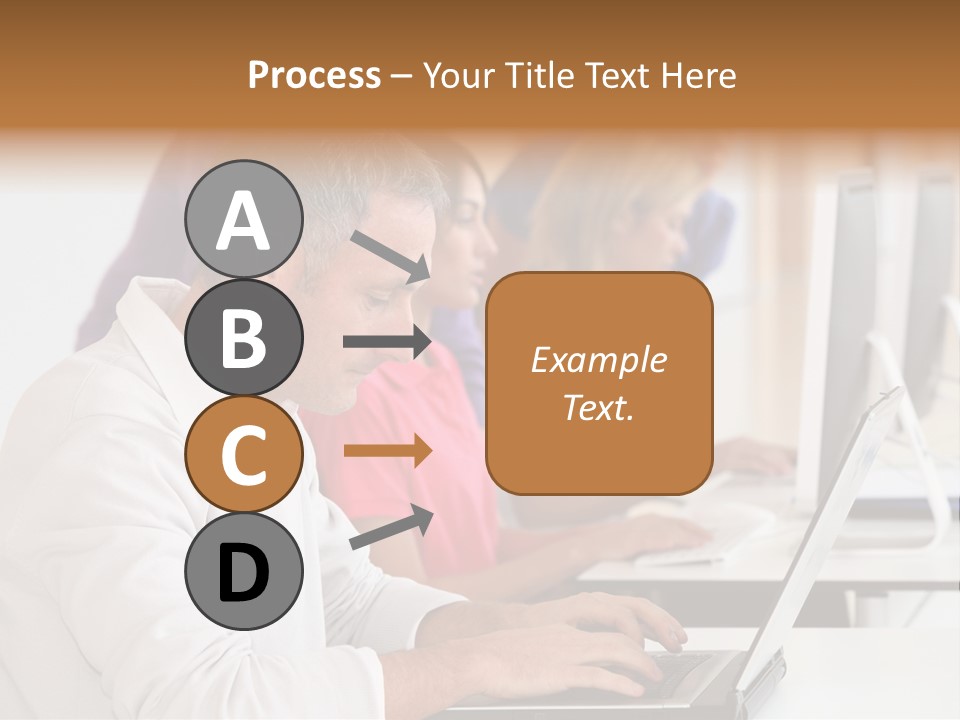 A Group Of People Sitting At A Table With Computers PowerPoint Template