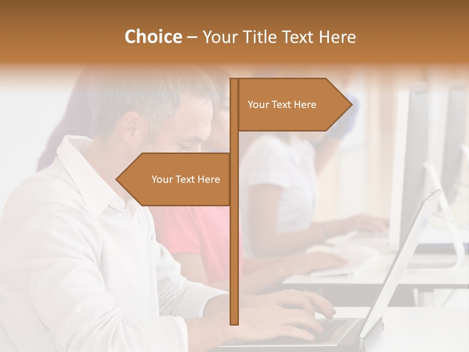 A Group Of People Sitting At A Table With Computers PowerPoint Template