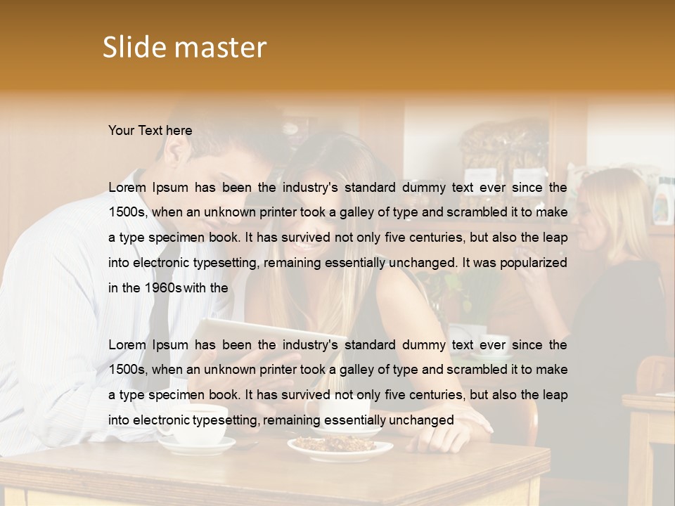 A Man And Woman Sitting At A Table Looking At A Tablet PowerPoint Template