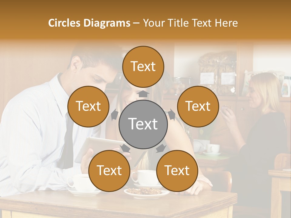 A Man And Woman Sitting At A Table Looking At A Tablet PowerPoint Template