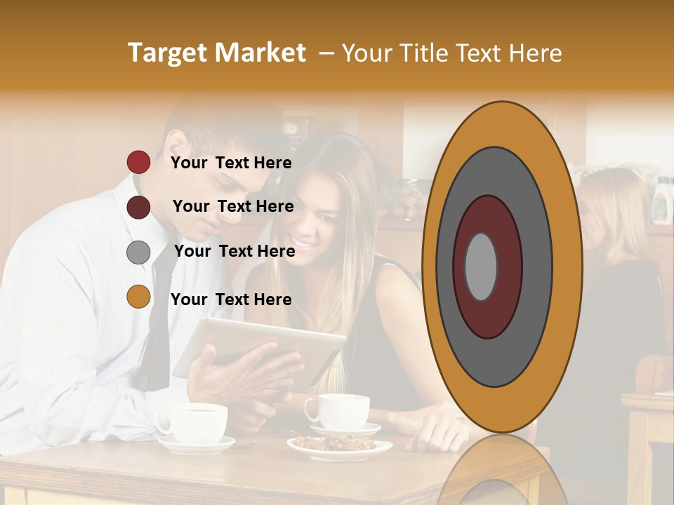 A Man And Woman Sitting At A Table Looking At A Tablet PowerPoint Template