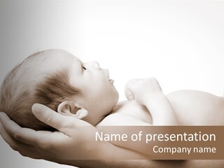 A Person Holding A Baby In Their Hands PowerPoint Template