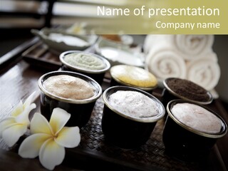 A Table Topped With Cups Filled With Different Types Of Drinks PowerPoint Template