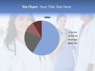 A Group Of Doctors Standing In A Hospital PowerPoint Template