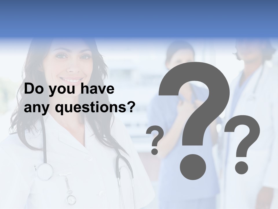 A Group Of Doctors Standing In A Hospital PowerPoint Template