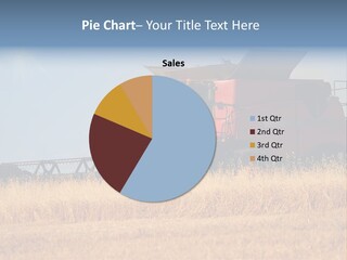 A Big Red Truck Is Driving Through A Field PowerPoint Template