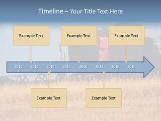A Big Red Truck Is Driving Through A Field PowerPoint Template