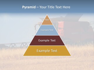 A Big Red Truck Is Driving Through A Field PowerPoint Template