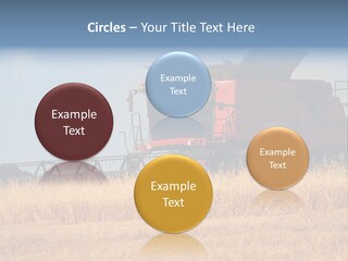 A Big Red Truck Is Driving Through A Field PowerPoint Template