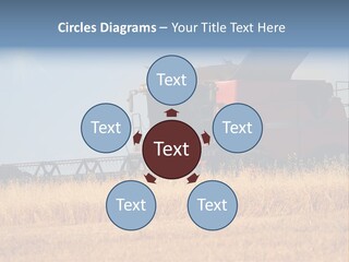 A Big Red Truck Is Driving Through A Field PowerPoint Template