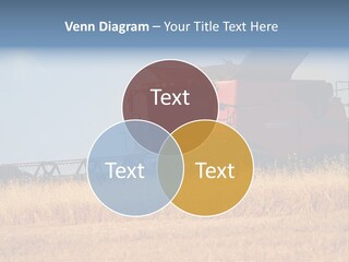 A Big Red Truck Is Driving Through A Field PowerPoint Template