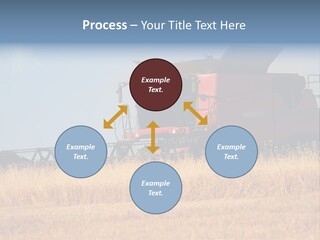 A Big Red Truck Is Driving Through A Field PowerPoint Template