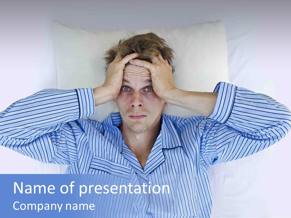 A Man Covering His Eyes While Laying In Bed PowerPoint Template