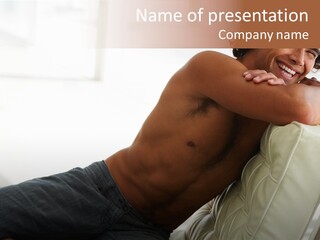 A Shirtless Man Is Sitting On A Couch PowerPoint Template