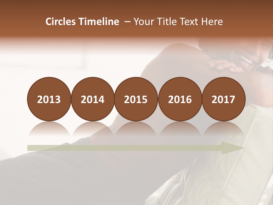 A Shirtless Man Is Sitting On A Couch PowerPoint Template