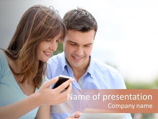 A Man And Woman Looking At A Cell Phone PowerPoint Template