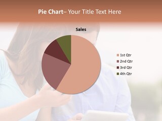 A Man And Woman Looking At A Cell Phone PowerPoint Template