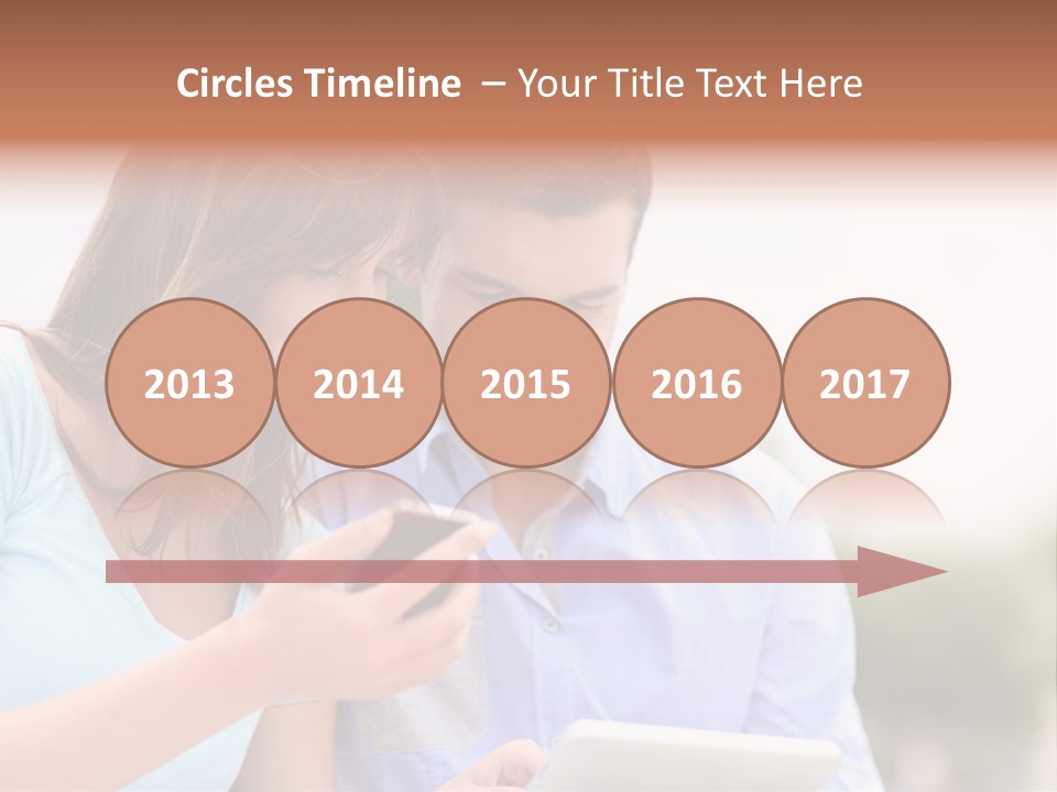 A Man And Woman Looking At A Cell Phone PowerPoint Template