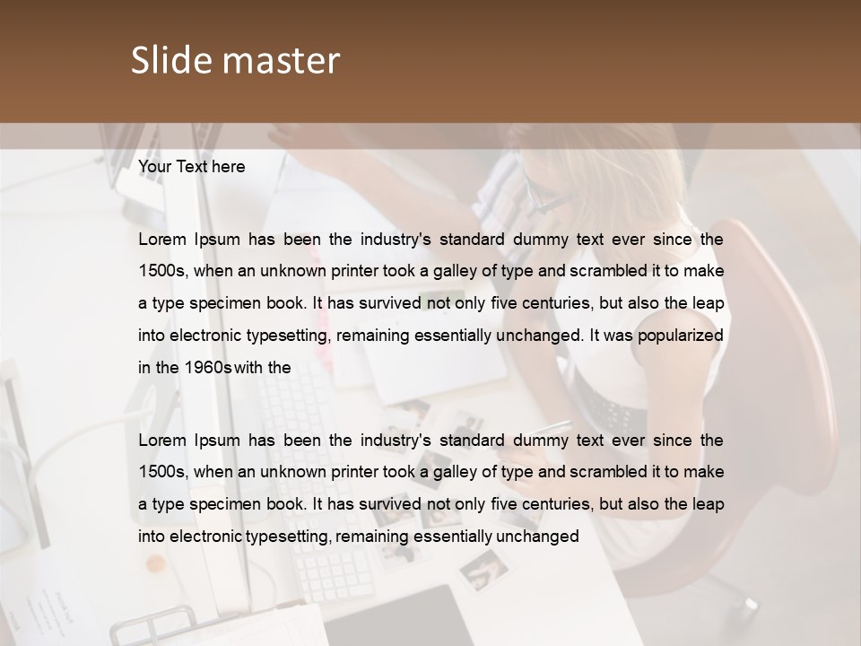 A Man And A Woman Sitting At A Desk Working On A Laptop PowerPoint Template