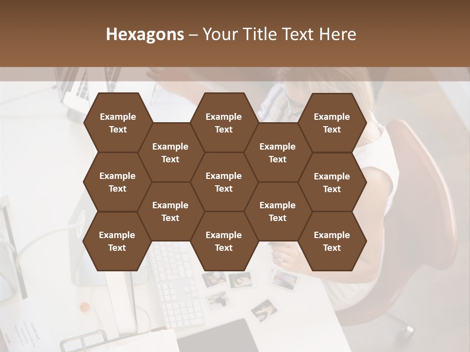 A Man And A Woman Sitting At A Desk Working On A Laptop PowerPoint Template