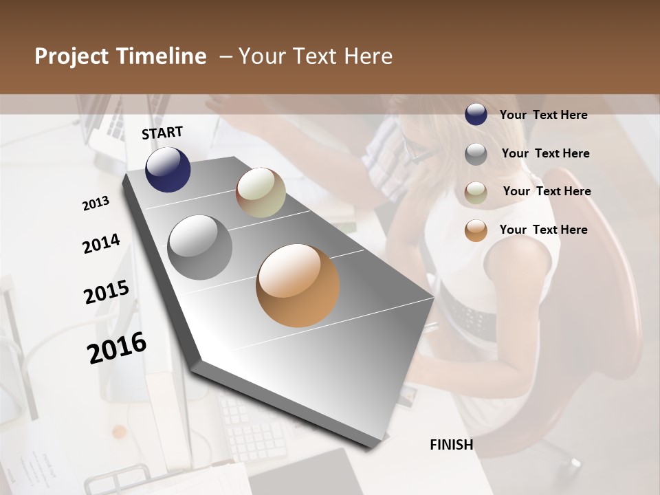A Man And A Woman Sitting At A Desk Working On A Laptop PowerPoint Template