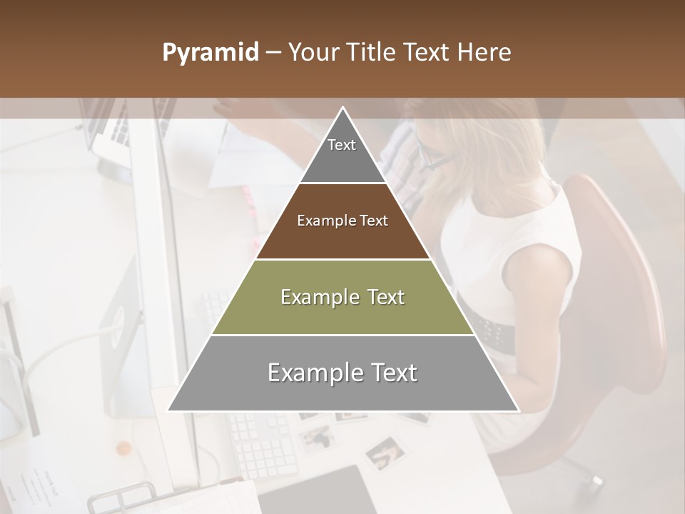 A Man And A Woman Sitting At A Desk Working On A Laptop PowerPoint Template