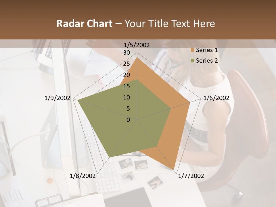 A Man And A Woman Sitting At A Desk Working On A Laptop PowerPoint Template
