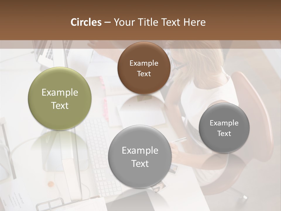 A Man And A Woman Sitting At A Desk Working On A Laptop PowerPoint Template