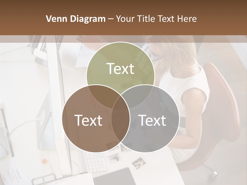 A Man And A Woman Sitting At A Desk Working On A Laptop PowerPoint Template