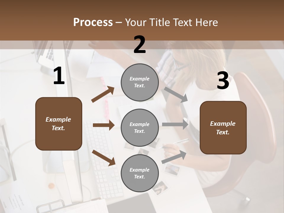 A Man And A Woman Sitting At A Desk Working On A Laptop PowerPoint Template