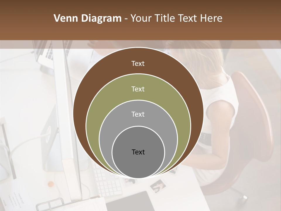 A Man And A Woman Sitting At A Desk Working On A Laptop PowerPoint Template