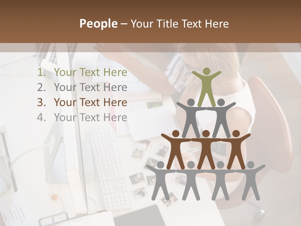 A Man And A Woman Sitting At A Desk Working On A Laptop PowerPoint Template