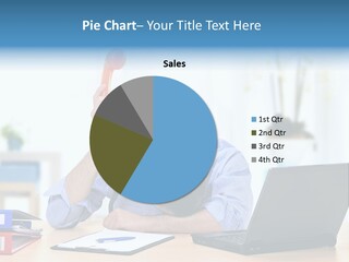 A Man Sitting At A Desk With A Laptop And Telephone PowerPoint Template