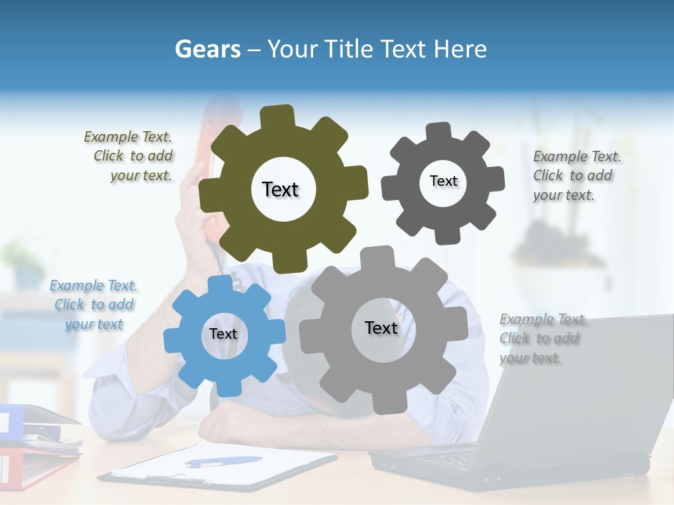 A Man Sitting At A Desk With A Laptop And Telephone PowerPoint Template