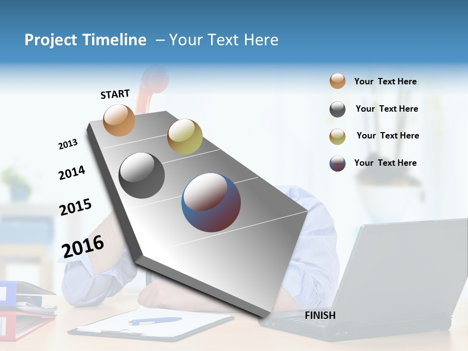 A Man Sitting At A Desk With A Laptop And Telephone PowerPoint Template