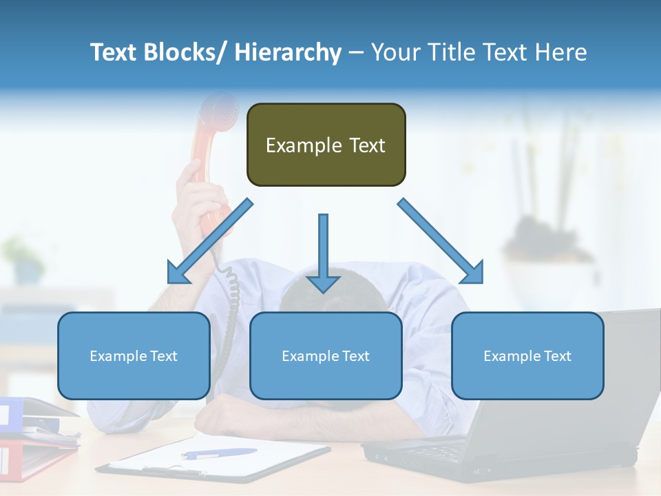 A Man Sitting At A Desk With A Laptop And Telephone PowerPoint Template